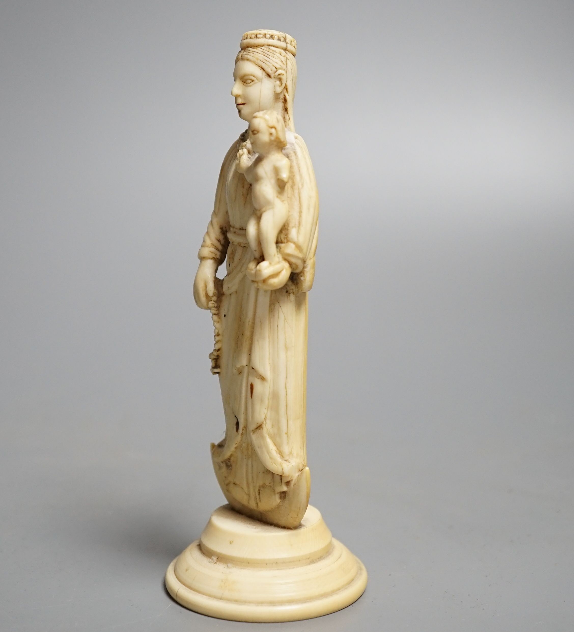 A 19th century Indo-Portuguese carved ivory model of the Virgin and child, height 15cm